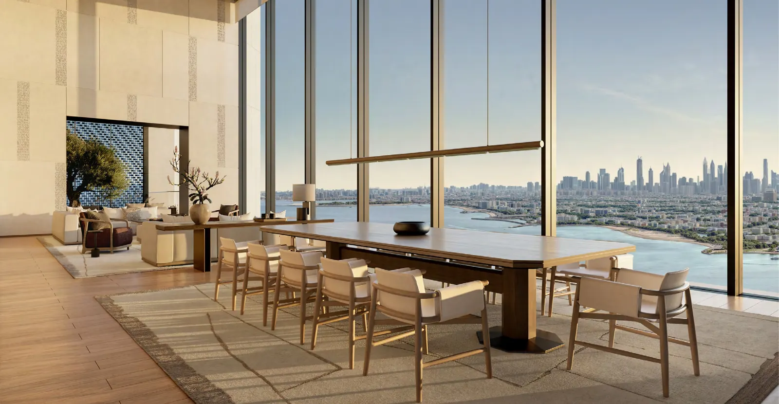 Open-plan living and dining room of a five-bedroom residence with views over the Gulf and city