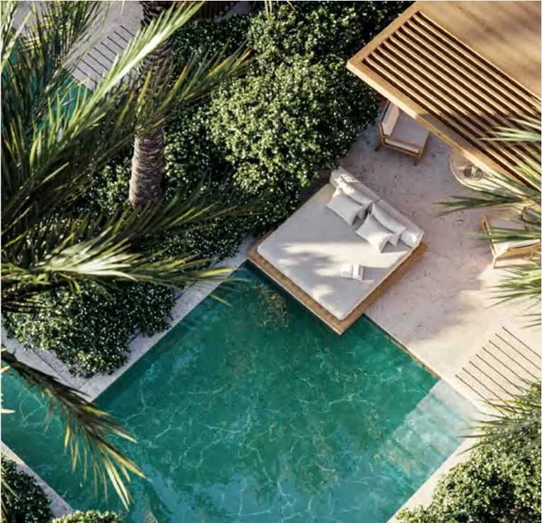 Aerial view of a garden pool and cabana within nine acres of landscaped gardens